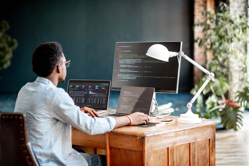 programmer-working-with-program-code-NFQBGND.jpg